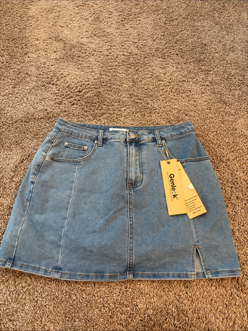 Light Blue Denim Mini Skirt with Front Seam and Slit